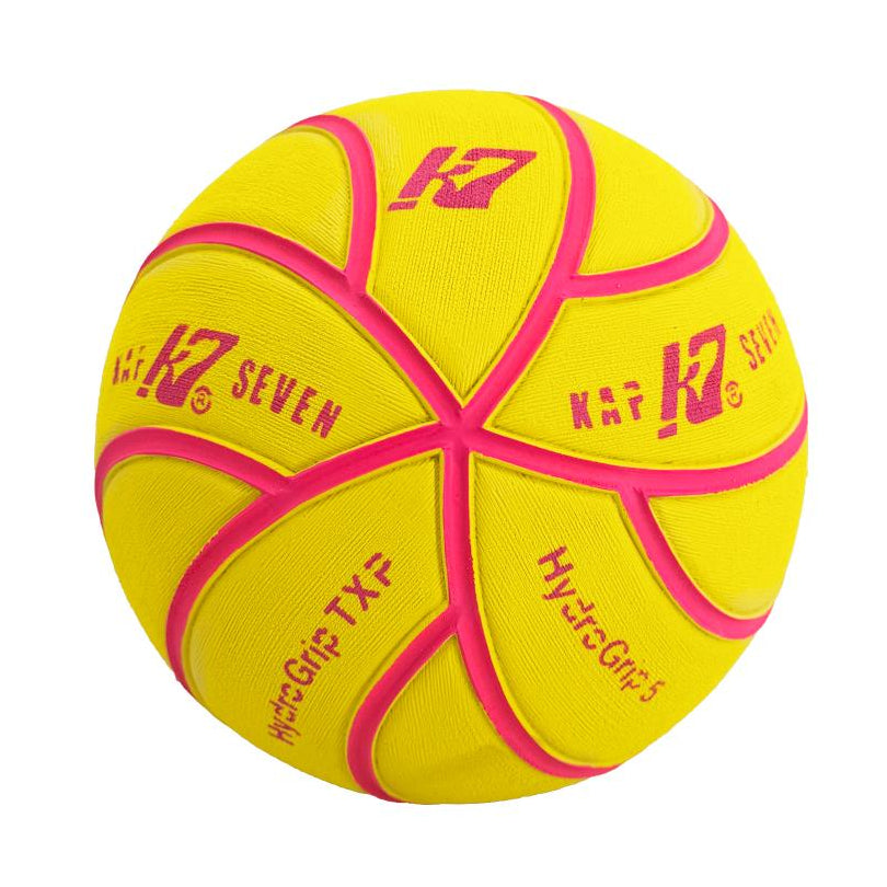 A yellow and pink Kap7 HydroGrip water-polo ball on a solid white background.
